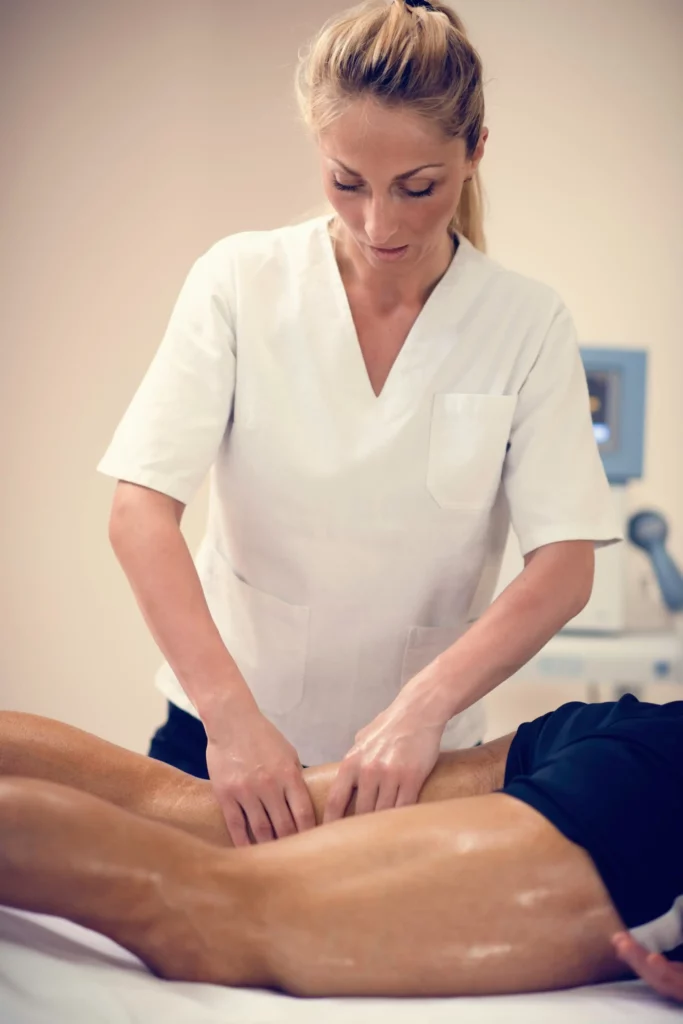 leg massage physical therapist massaging leg 2023 11 27 05 01 36 utc